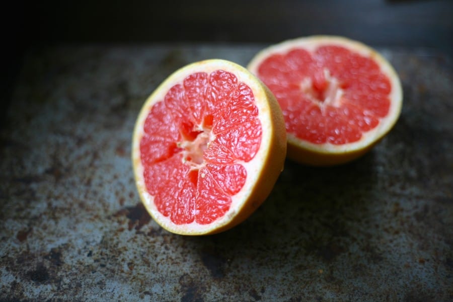 pink grapefruit cut in half