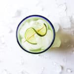 single baja inspire margarita in a glass with lime swirl