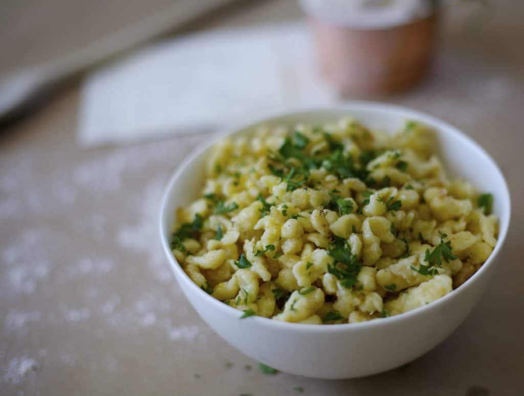 Grandma's german spaetzle recipe with a healthier twist but same great flavor. A light egg noodle with fresh herbs and lemon.