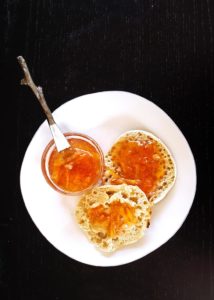 citrus marmalade on top of toasted english muffin