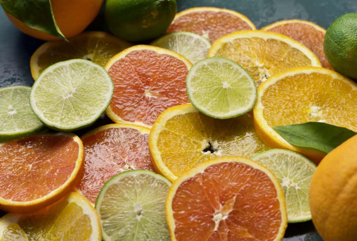 sliced lemons, grapefruit, oranges and limes piled on top of each other