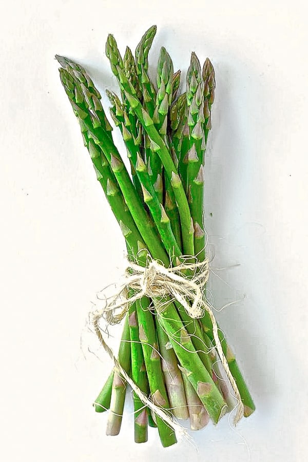 spring asparagus tied with brown string