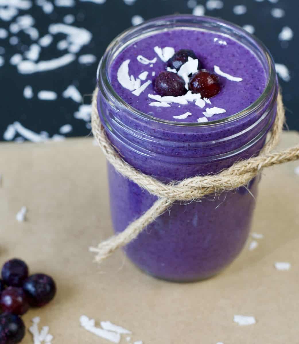 coconut blueberry smoothie in glass jar