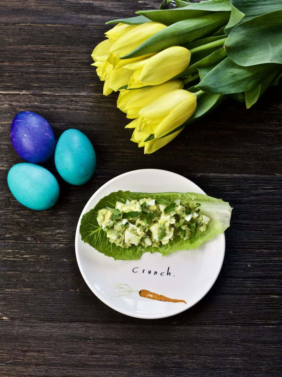 healthy egg salad wrap with easter eggs and tulips