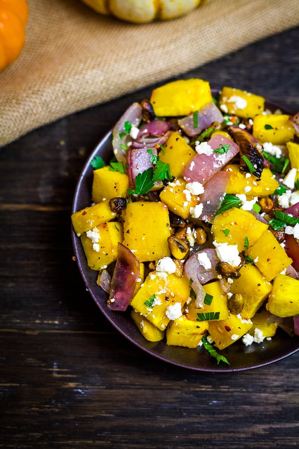 roasted pumpkin with feta and pistachios recipe perfect for fall or holiday meals. 