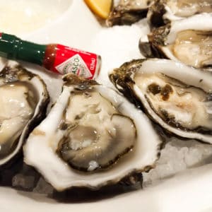 oysters on half shell with tobacco 