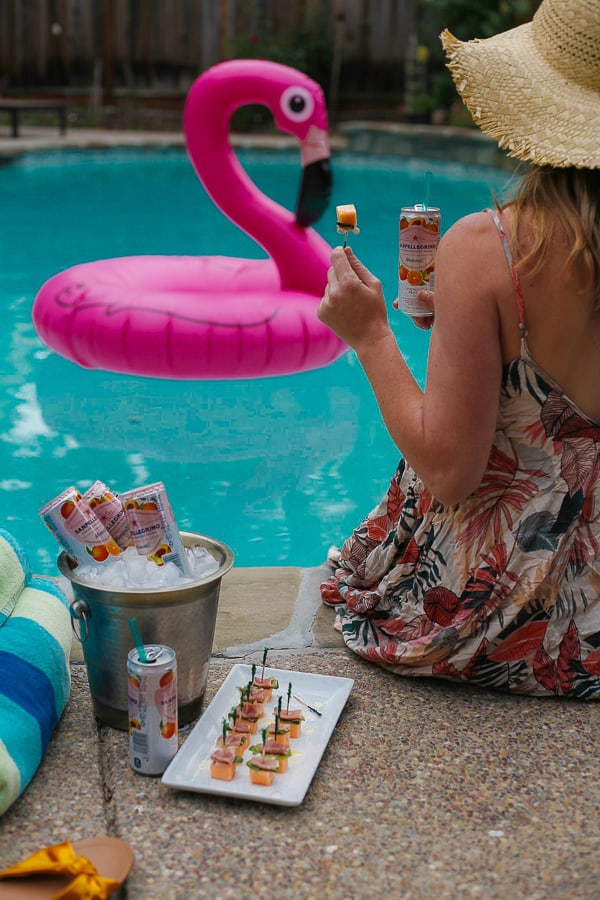 sitting poolside with mediterranean inspired summer snack