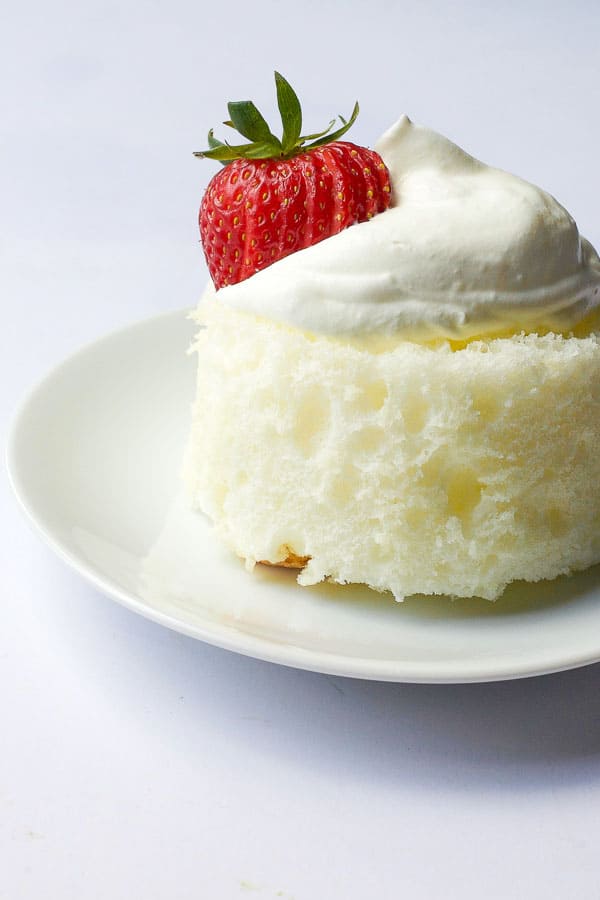 mother's day dessert - light and fresh mini angel food cake with strawberries and almond whipped cream