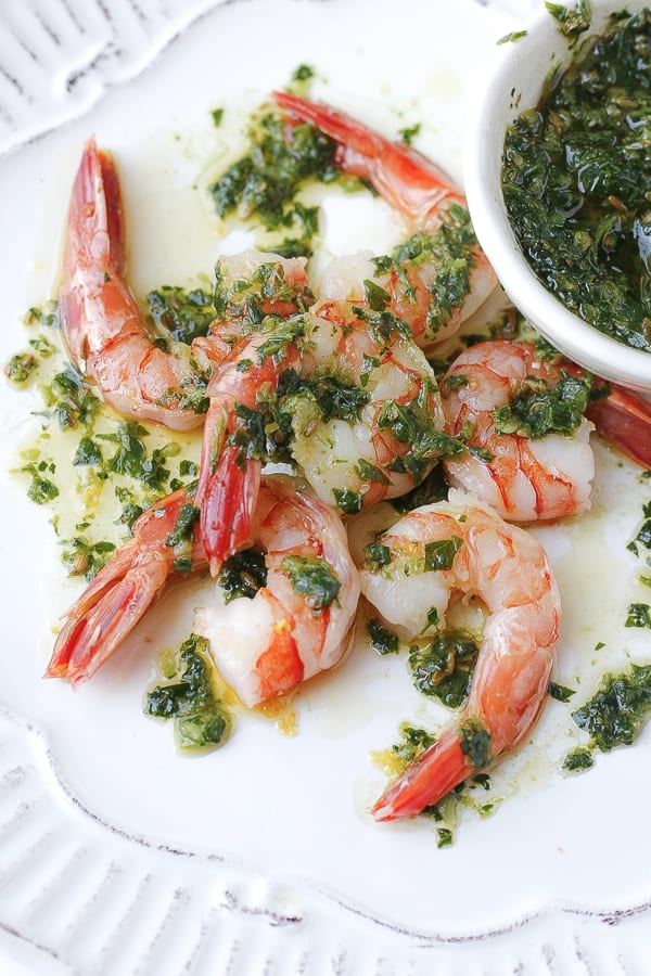 close up of sautéed shrimp with moroccan herb sauce chermoula