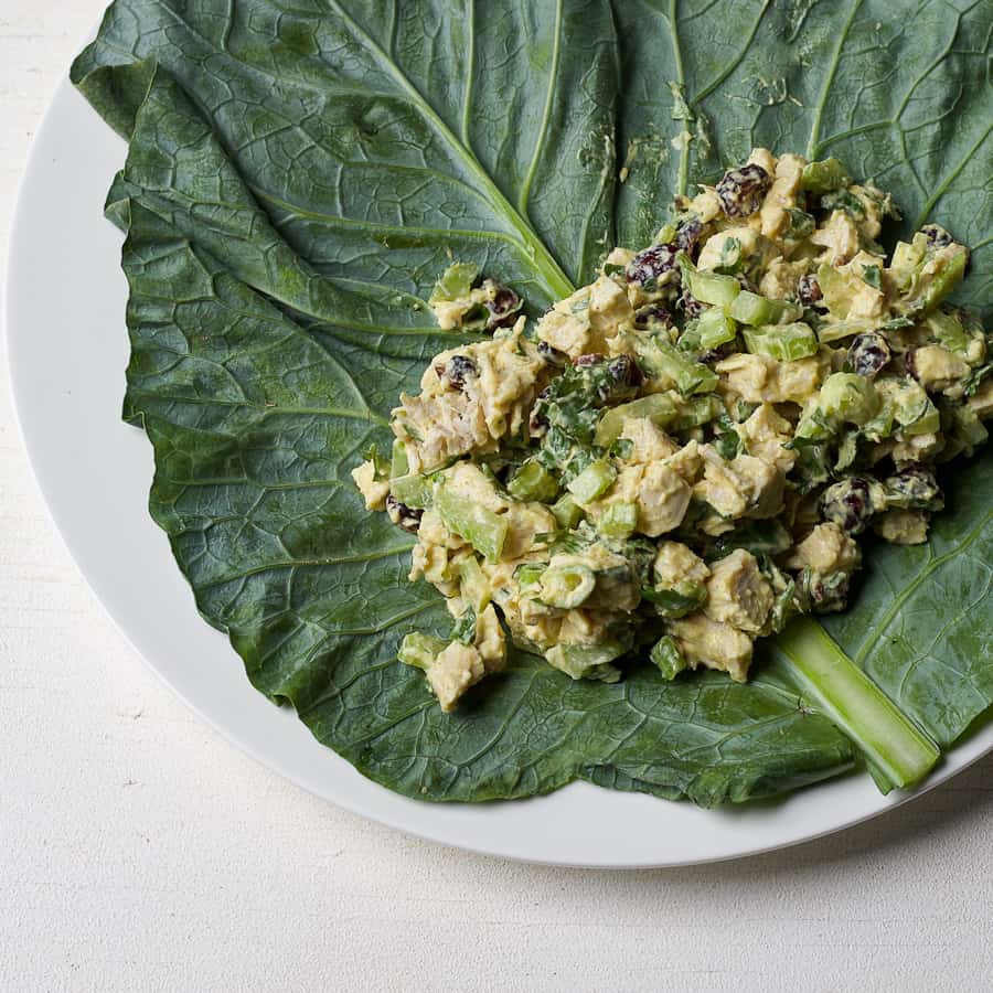 chicken salad on large collard green leaf