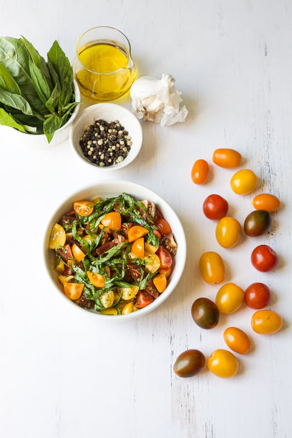 garden fresh cherry tomatoes with basil and olive oil