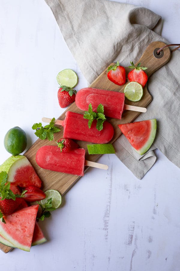 cutting board with healthy homemade popsicles