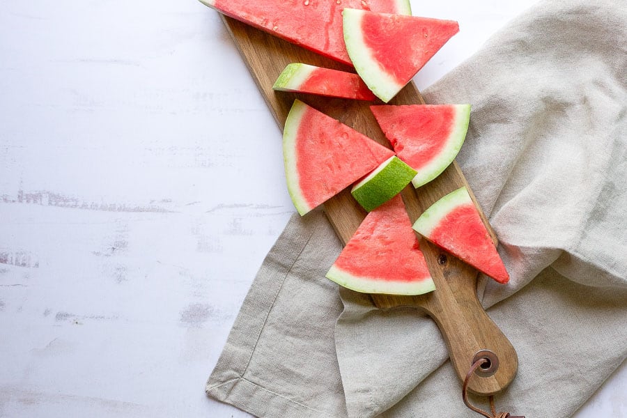 sliced watermelon on cutting board