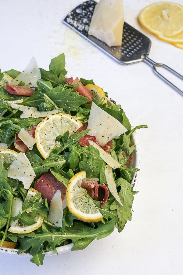 tuscan arugula salad with parmesan cheese lemon and prosciutto