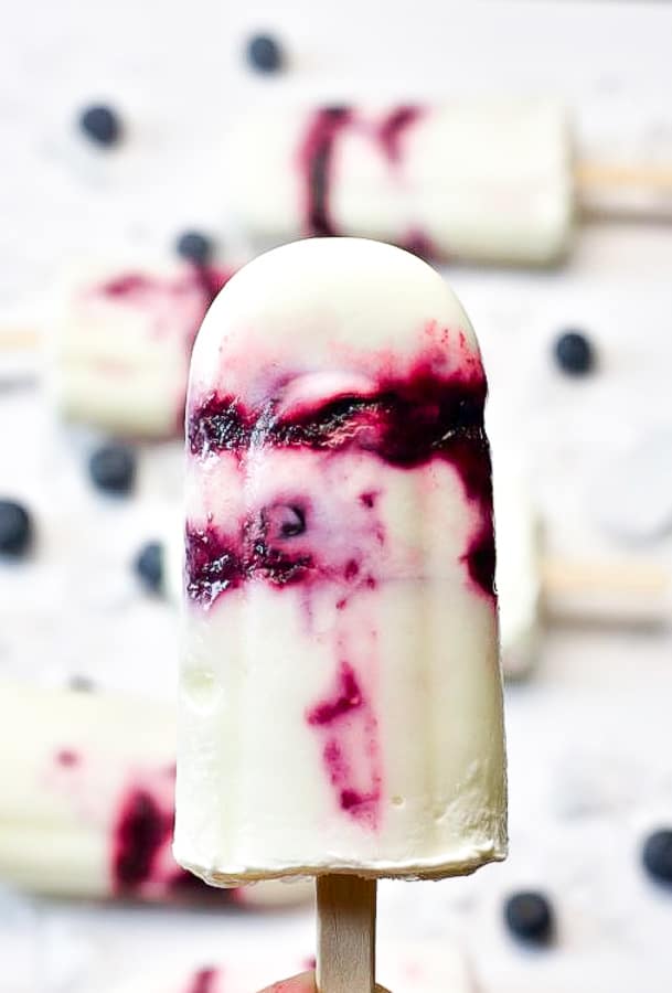 close up of blueberry yogurt popsicles