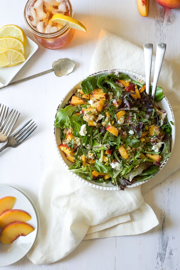 summer peach salad with couscous and pistachios as part of the mediterranean diet