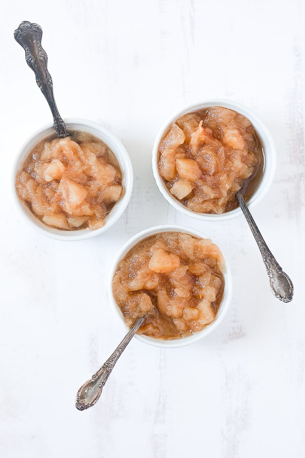 three bowls of no added sugar slow cooker applesauce