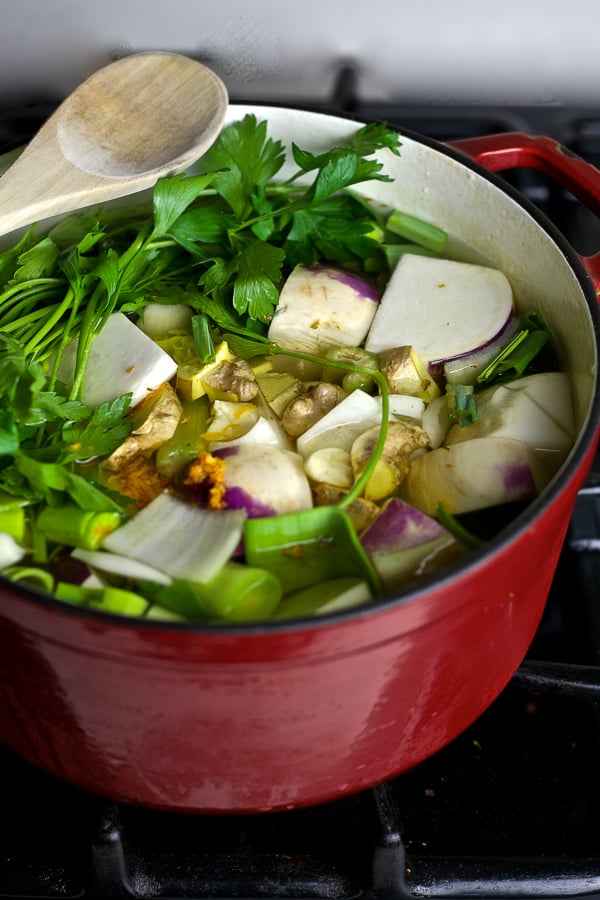 gut healthy turmeric vegetable broth simmering on stove