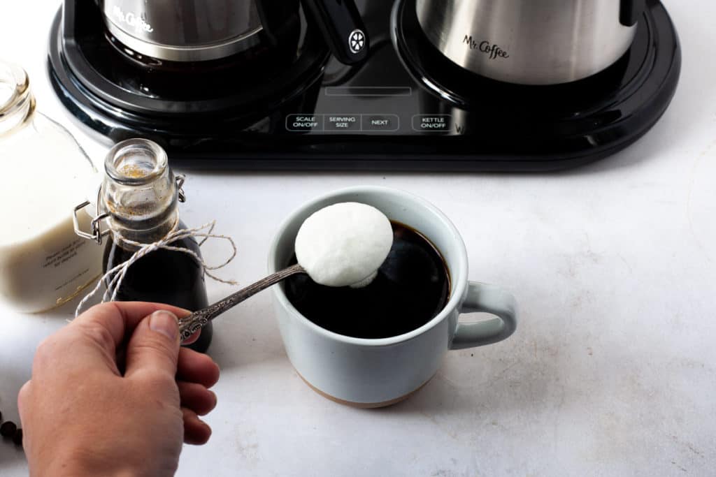 adding foam to homemade gingerbread latte