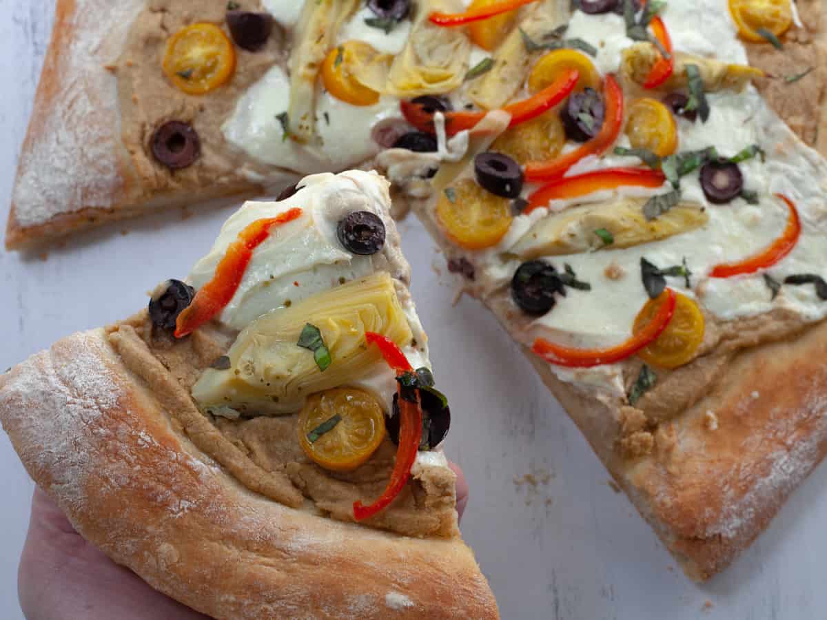 mediterranean pizza slice close up