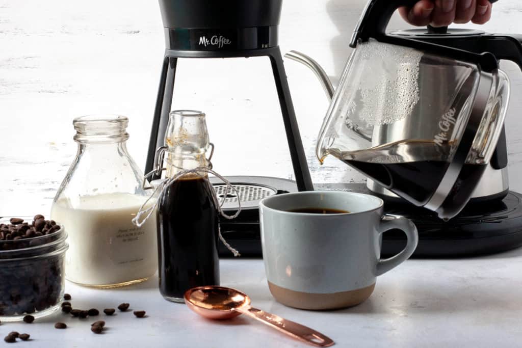 pouring coffee into homemade gingerbread latte