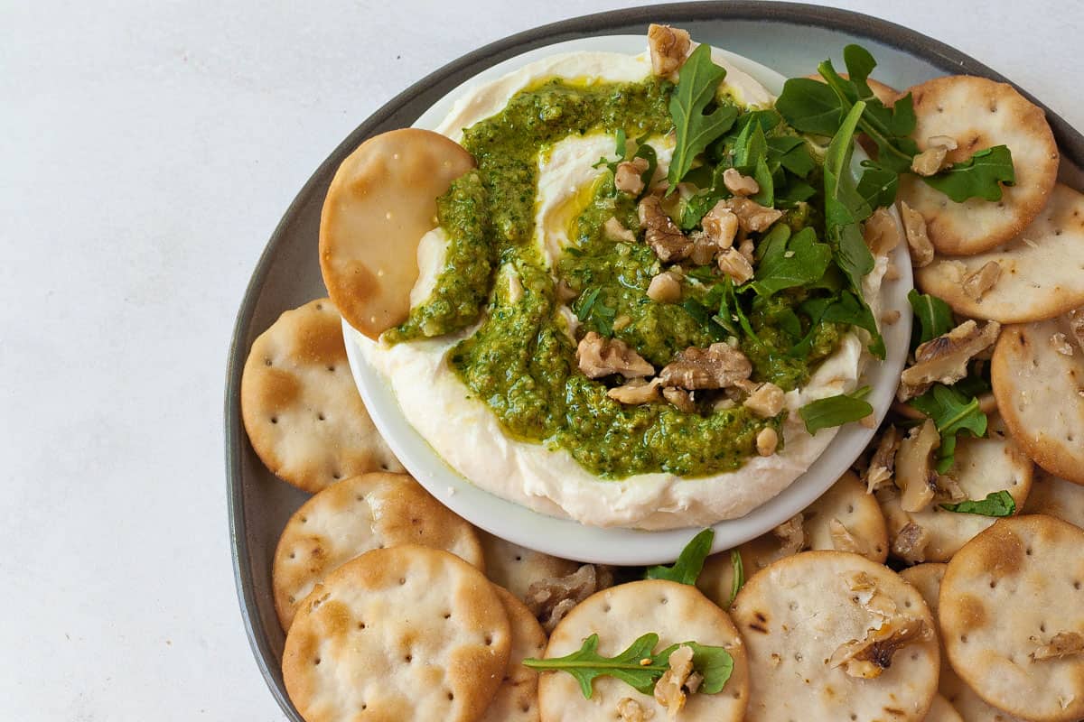 whipped walnut pesto dip with crackers