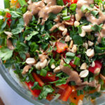 Thai inspired veggie salad with peanut dressing