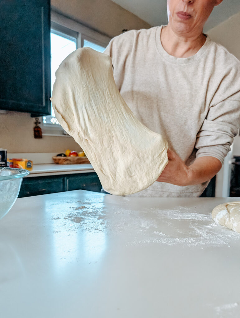 throwing pizza dough